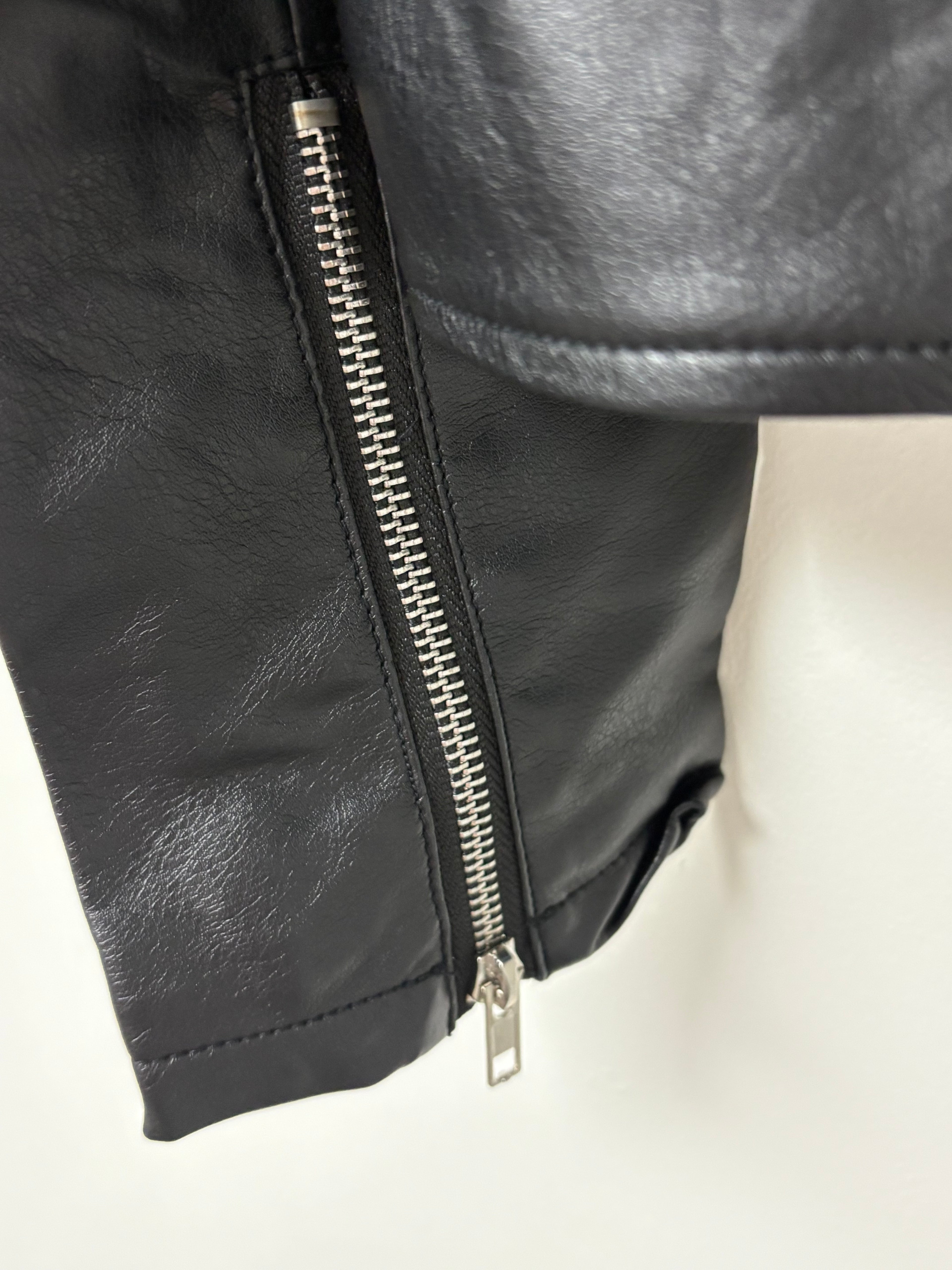 Zenana black faux leather moto jacket.